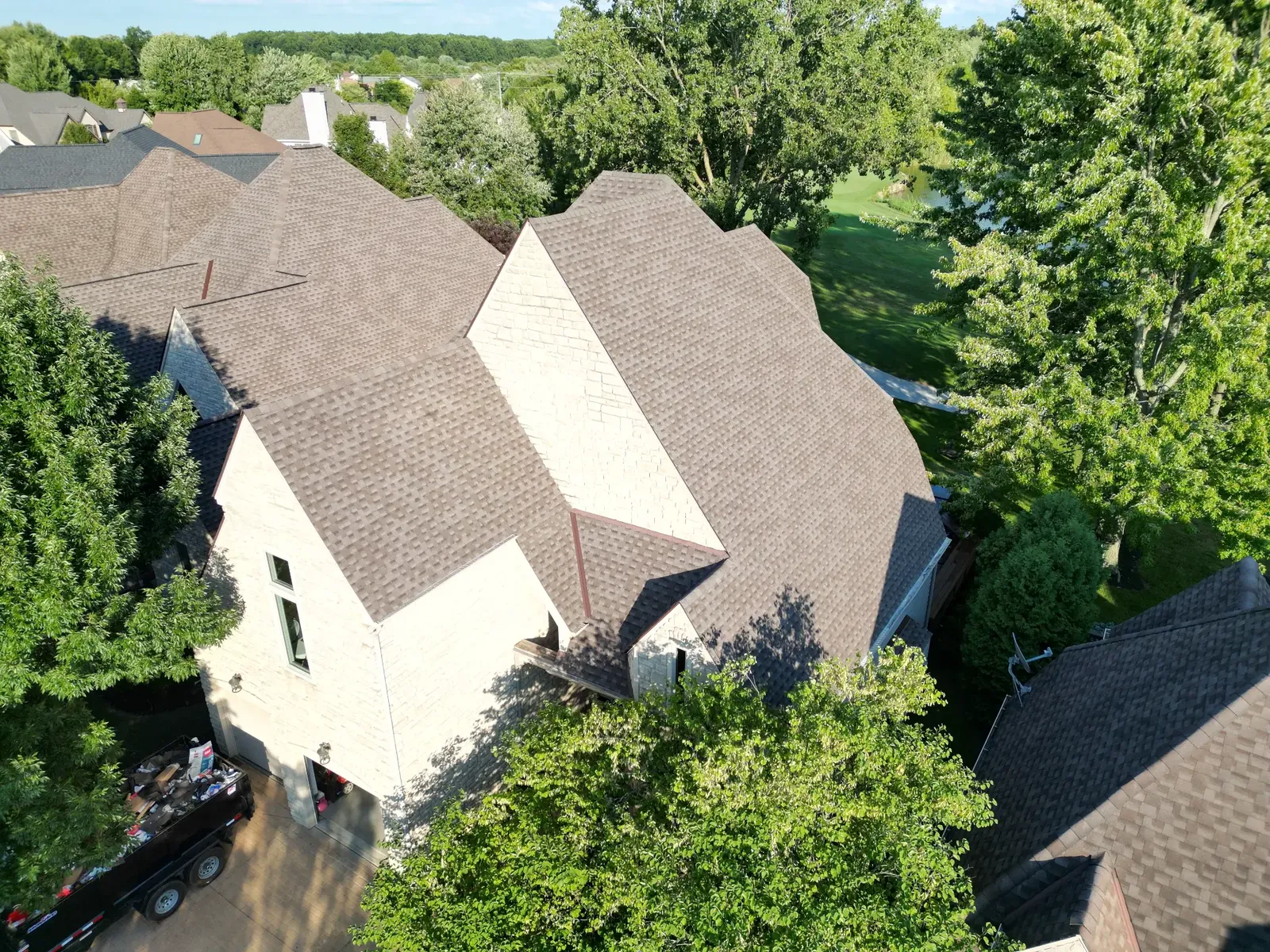 Aerial view of a brown architectural shingle roof installation in Avon, Ohio
