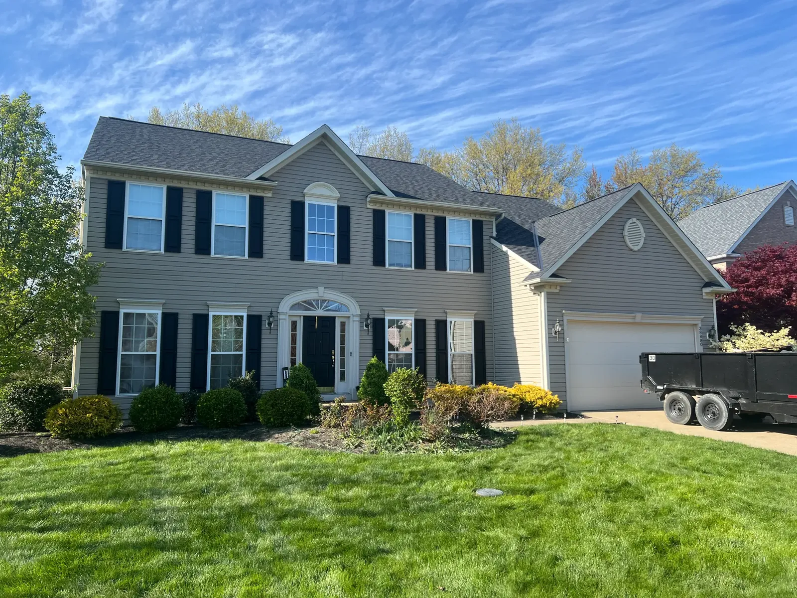 Completed architectural shingle roof replacement on a home in Avon, Ohio